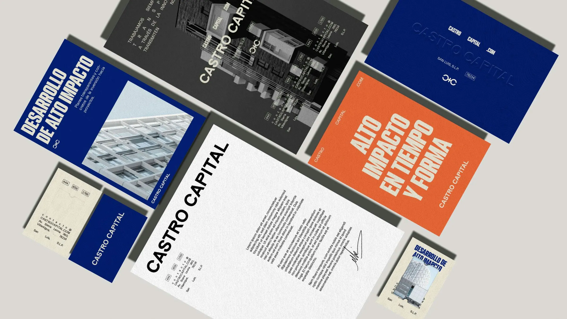 Printed brand collateral and brochures laid out on a desk